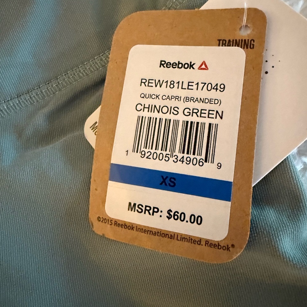 Reebok Women's Capris - Set of 4 1-Mint, 1-Silver, 1-Black and 1 black short. - Picture 3 of 14